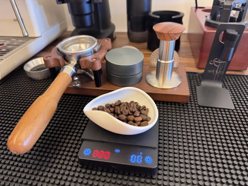 home espresso puck prep workflow with tamper distributor WDT tool and coffee scale