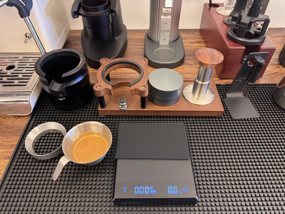 home espresso workflow with coffee scale and espresso tools