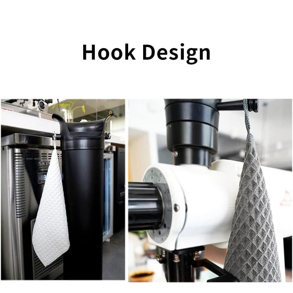 Barista microfiber cleaning cloth hanging on espresso grinder hook