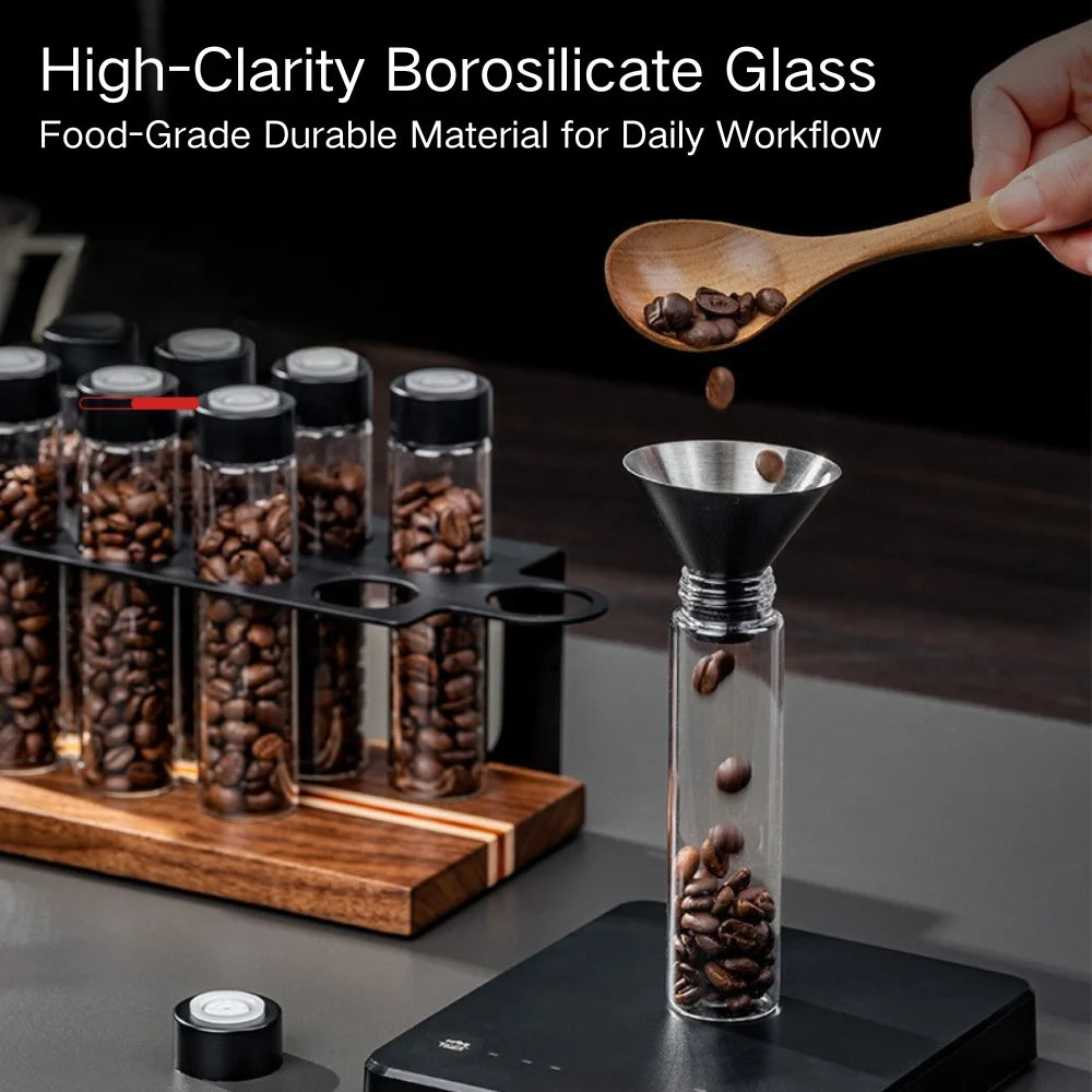 High-borosilicate glass storage tubes filled with single-dose coffee beans.