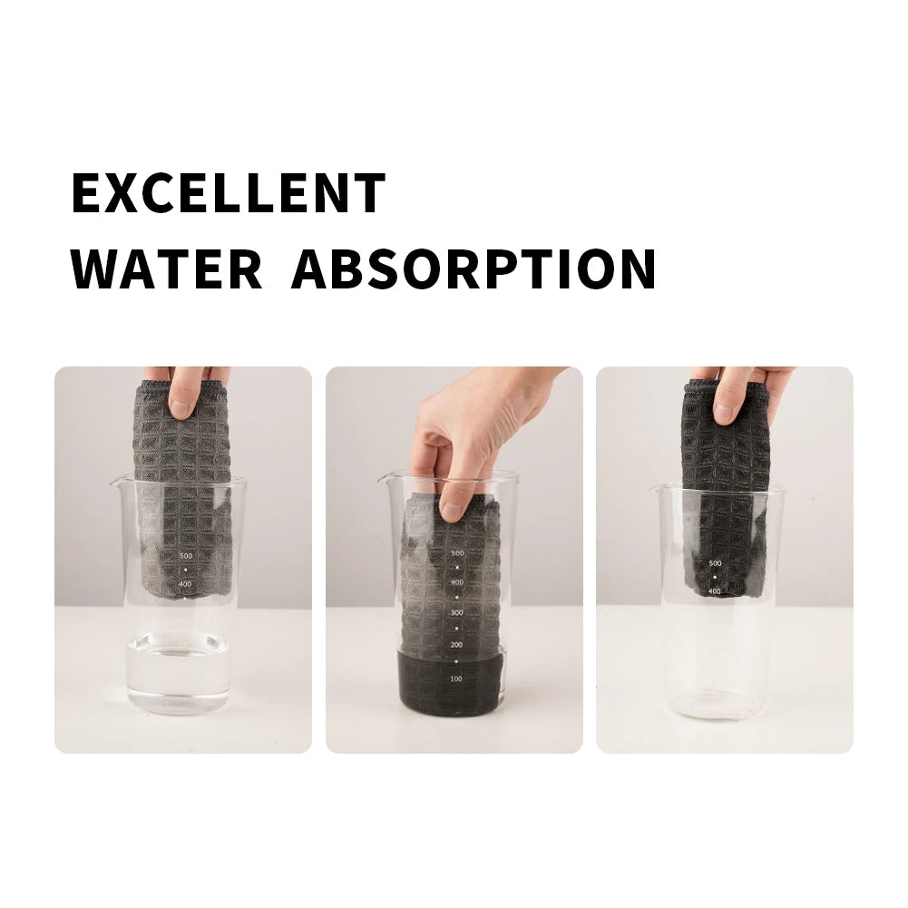 Microfiber coffee cloth absorption test with water in glass beaker