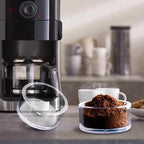 Clear espresso puck prep cup used with home espresso workflow