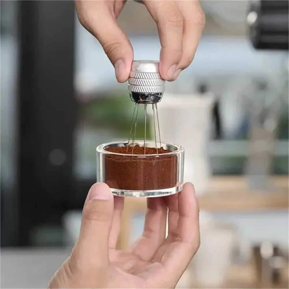 Using a clear espresso puck prep cup to practice WDT distribution