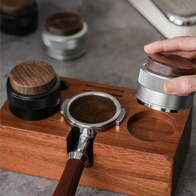 Culturbo premium coffee tamper and distributor collection available in matte black and sleek silver.