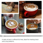 Barista using free latte art pen tool to create crisp espresso patterns in coffee cup.