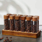 14-piece single dose coffee bean storage tubes with solid walnut wood stand.