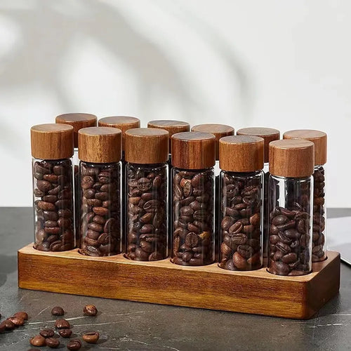 14-piece single dose coffee bean storage tubes with solid walnut wood stand.