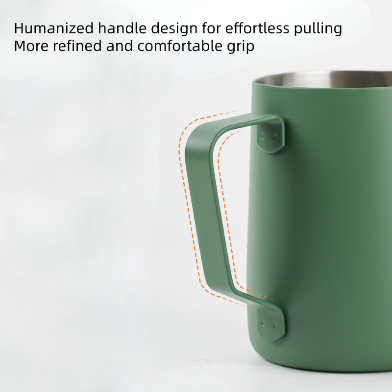 Ergonomic humanized handle design of the green milk frothing jug.