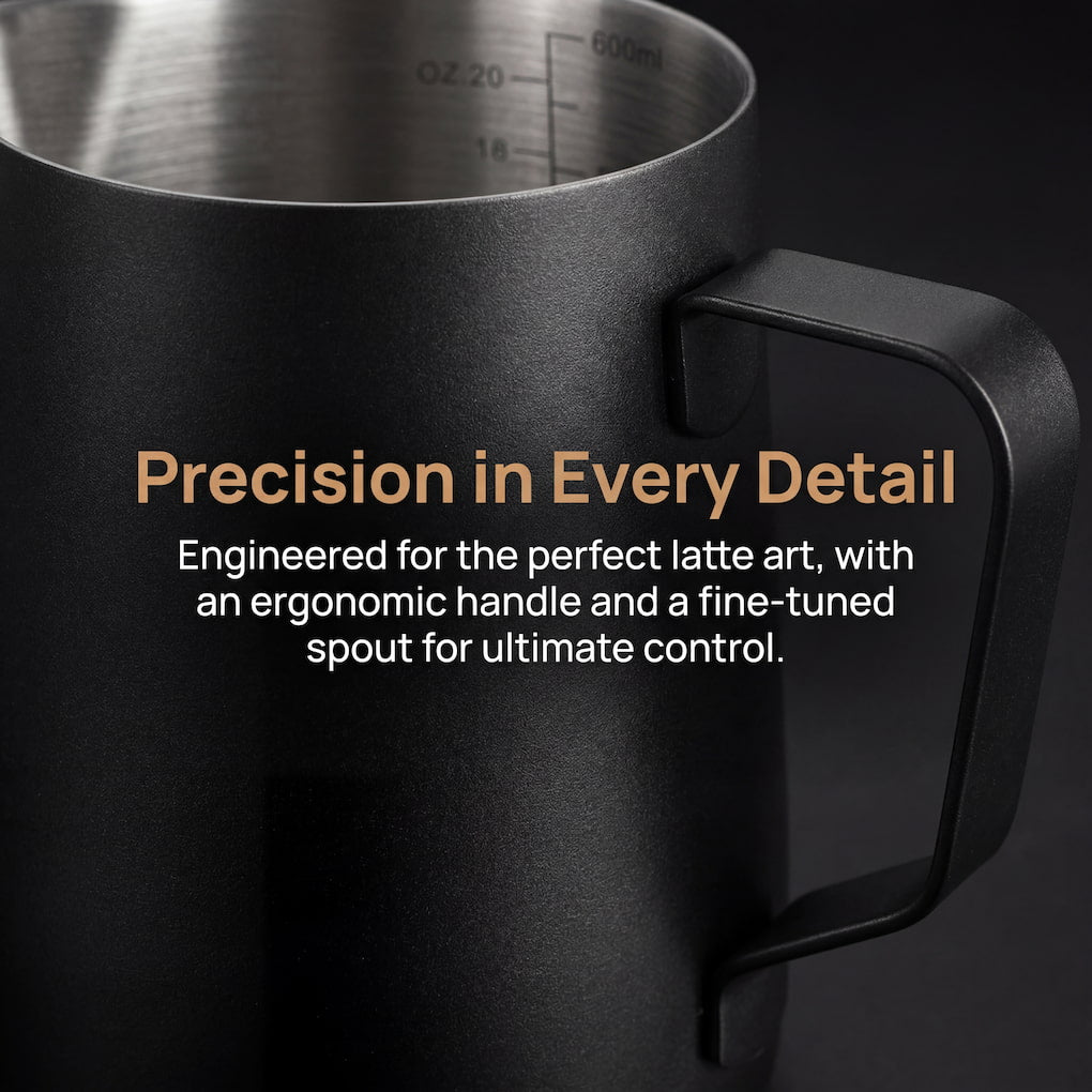 Comfortable handle design on precision milk frothing pitcher