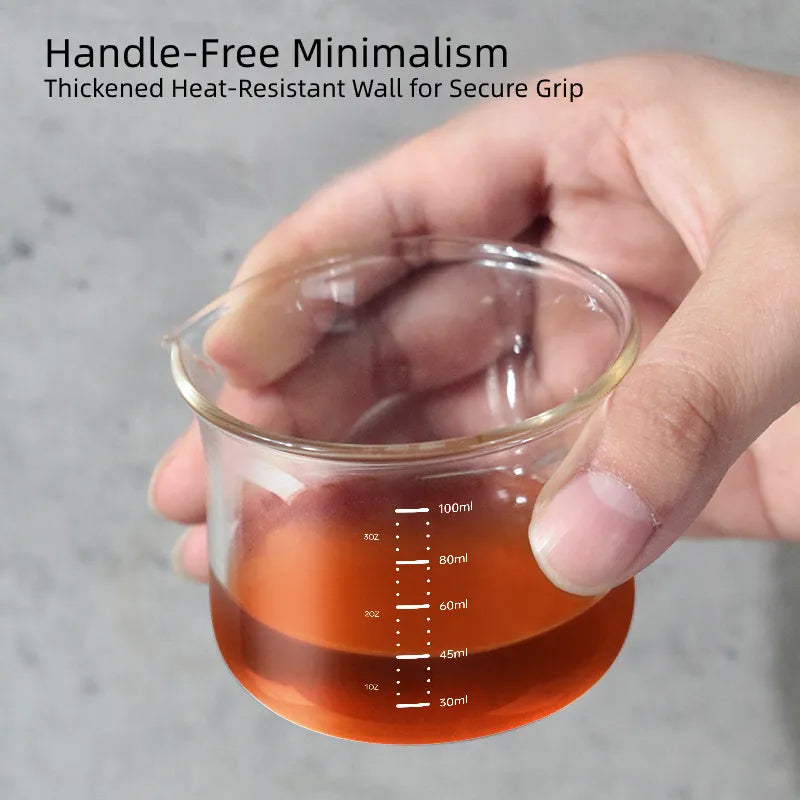 Ergonomic handle-free minimalist design with thickened stable base for espresso bar.
