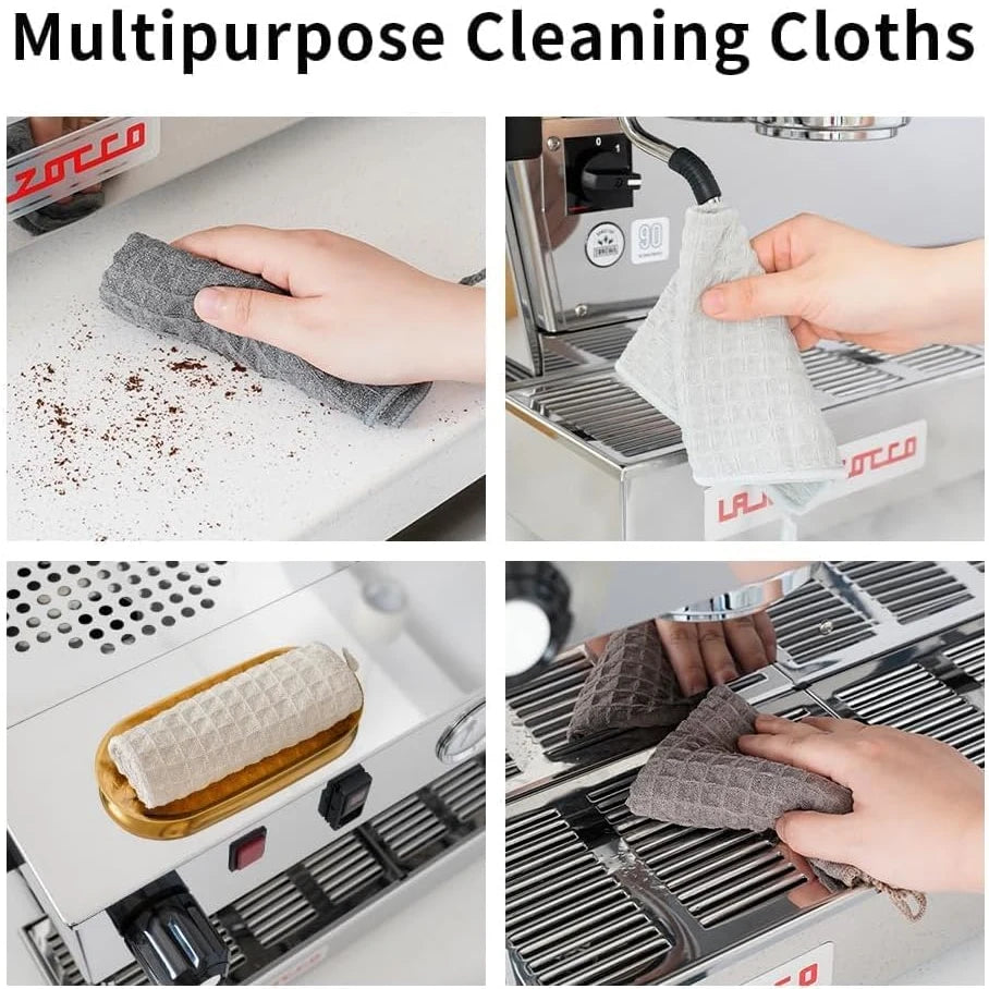 Barista wiping espresso machine countertop and portafilter with microfiber cloth