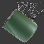 Side view of textured matte green finish espresso milk steaming pitcher.