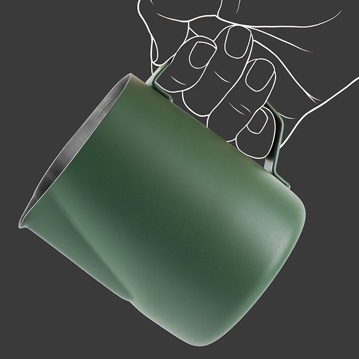 Side view of textured matte green finish espresso milk steaming pitcher.