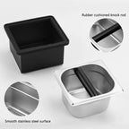 Close up of the detachable black shock-absorbing silicone cushion bar separated from the stainless steel knock box slots.