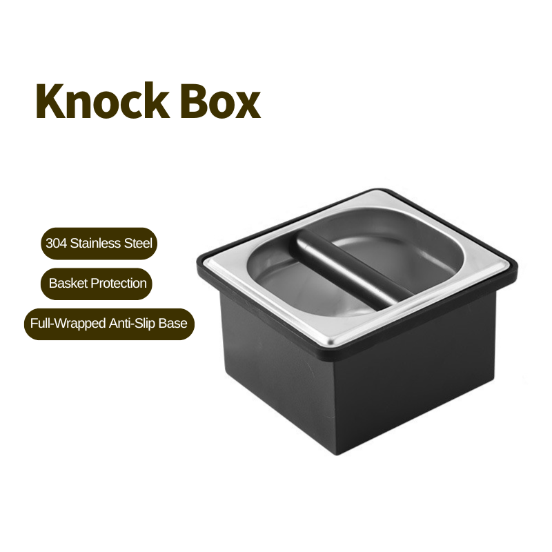 High-angle shot of a premium small stainless steel espresso knock box with a black silicone protective bar on a gray background.